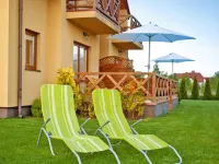 Half of Holiday Home, Terrace, Playground Hotels in Rowy