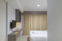 Cozy Studio Room at Patraland Amarta Apartment - Business