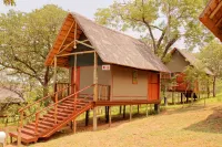 Lion Roars Lodge Hotels near Thebe River Camping