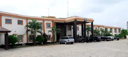 Tiffany Hotel and Towers Отели в г. Осуаха