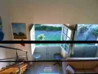 large terrace overlooking the sea and the sand dunes