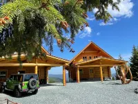Living above the clouds in a log cabin