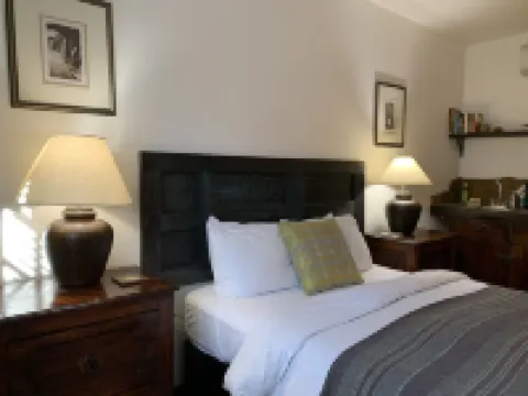 Luxurious and sanitized Studio, original adobe walls, wood floor, real sanctuary