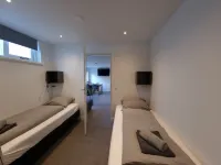 Modern styled holiday home at the base of the dunes, nearby beach and sea!