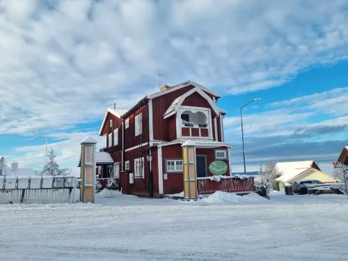 Lustigsgården Boutique Hotel فنادق في Tallberg