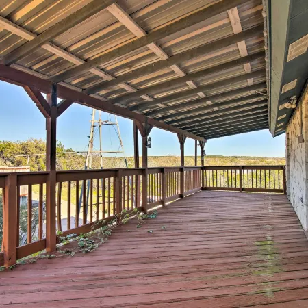 Sunny Lakefront Escape w/ Private Beach & Deck