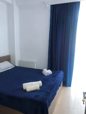 Beachfront apartment with mountain and sea views