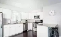 Torch Lake 4 bedroom home w/ large yard & parking