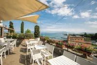 Casa di Paola: Lake-View Balcony Apartment in Peschiera - Happy Rentals - Apartments