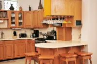 Welcome to the Unpretentious and Breezy Graceville, Steps Away from the Beach