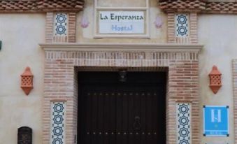 "a door with a sign that says "" la enforma "" in the top right corner" at La Esperanza