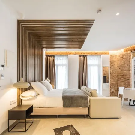 Mon Suites Benlliure Отели рядом с достопримечательностью «Лонха-де-ла-Седа»