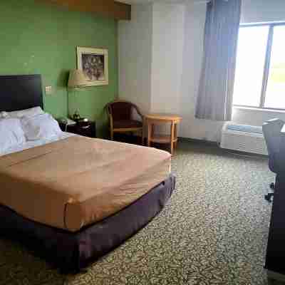Pleasant Stay Inn & Suites Rooms