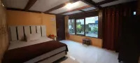 Rumah Panggung Mila Family Hotels in Cisolok