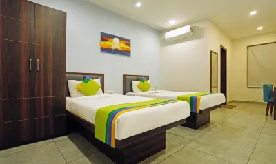 Treebo Lazystay Grand Patia Hotels near V-Mart