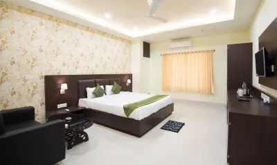 Treebo King's Court Chandrasekharpur Hotels near V-Mart