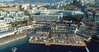 Delta Hotels by Marriott Bodrum Отели рядом с достопримечательностью «Granada Beach Club»