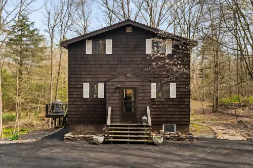 Poconos Retreat with Hot Tub, Fire Pit & Game Room Hotels in Price Township