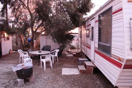 Cozy 80s Safari Style RV in Tranquil Bombay Beach with AC