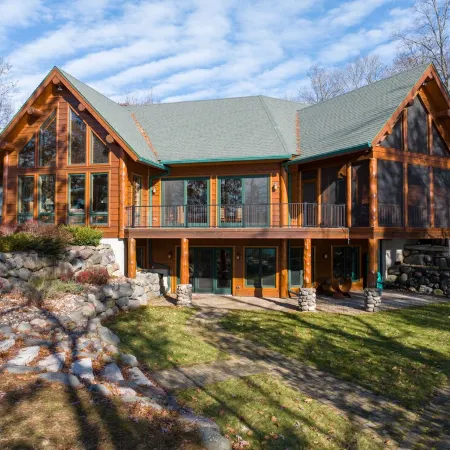 Custom-Built Log Cabin Family Friendly Home on Round Lake, Close to Trails!