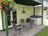 Excellent ground floor 2 Bed apt overlooking golf course with private parking.