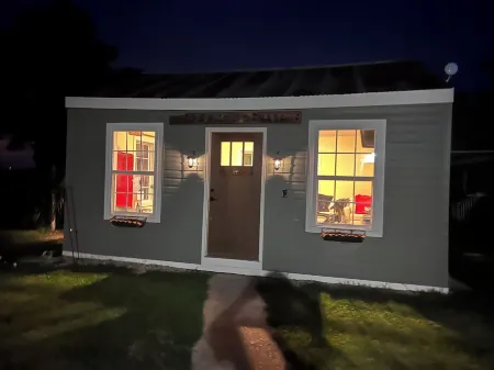 Single family home with screened porch.