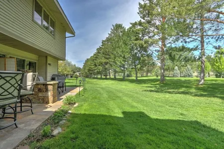 Spacious Condo on Golf Course w/Fireplace, Firepit, Patio and 2 Fishing Badges!