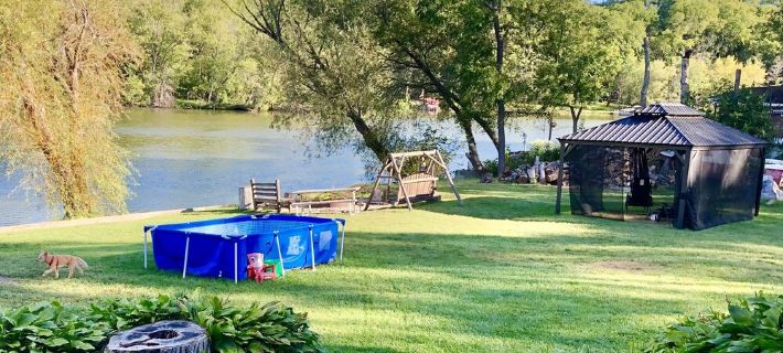 220’ Waterfront Beach Home Rock River WI Pets Pier Pools FP Fishng Boat Kayaks Hotels in Rock County