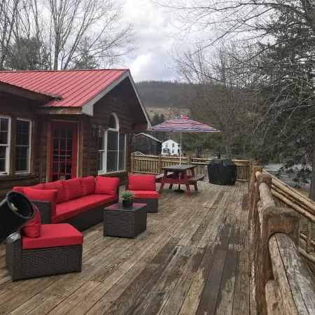 Spectacular Catskill Mountain River Front Custom Log Home