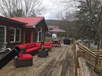 Spectacular Catskill Mountain River Front Custom Log Home