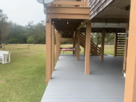 4X4 only! Canal front. Ocean AND sound views! Decks and porches on all levels.