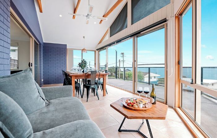 Retreat by the Sea – Coastal Escape with Cozy Spa & Panoramic Ocean Sunset Views