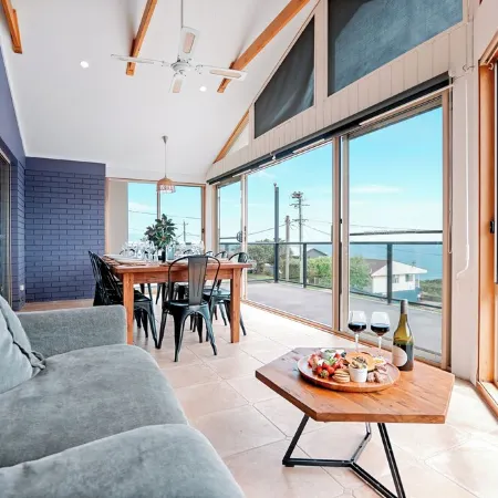 Retreat by the Sea – Coastal Escape with Cozy Spa & Panoramic Ocean Sunset Views