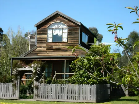 Sanctuary Park Cottages Отели в г. Баджер Крик