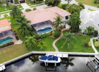 Punta Gorda Isles Canalfront Vacation Home with Private Pool  andBoat Lift