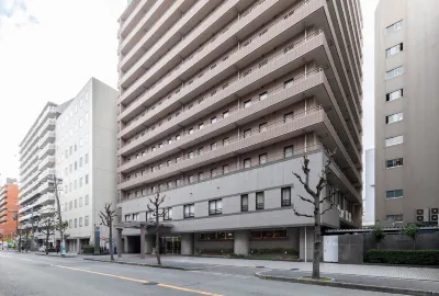 Sunny Stone Hotel Hotels near 関西大学 南千里国際学生寮 Kansai University International Dormitory