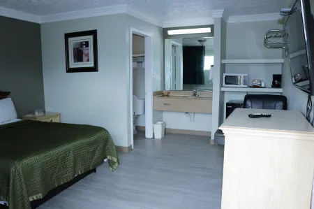 Deluxe Inn Motel Отели в г. Мосс Блафф