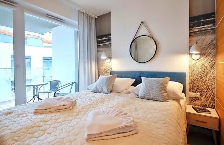 Apartamenty Balticon Nadmorskie Tarasy Отели рядом с достопримечательностью «Kolobrzeg Sea Port»