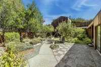 Charming ocean view home with two private hot tubs, pools, and washer/dryer