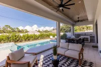 Heated Pool, Full Outdoor Kitchen and Game Room - Luxe Coastal Retreat Hotels in North Naples