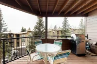 Lakefront Condo with Mountain Views & Shared Hot Tub - Walk to Town & Ski Access