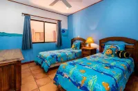 Warm Interiors and Orange Hues on Ground Floor in Front of Beach Hotels near Playa Flamingo
