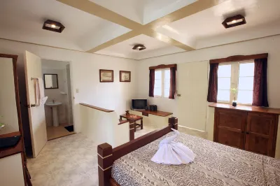 Guindulman Bay Tourist Inn Hotels near MOJAVic Beach Resort