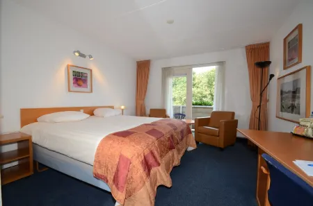 Fletcher Hotel - Restaurant de Zeegser Duinen Отели в г. А-эн-Хюнзе