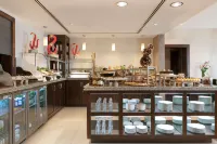 Traders Hotel，Qaryat AI Beri, Abu Dhabi - bar