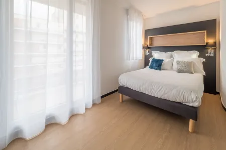 Apparthotel le Hüb Grenoble Отели в г. Сент-Эгрев