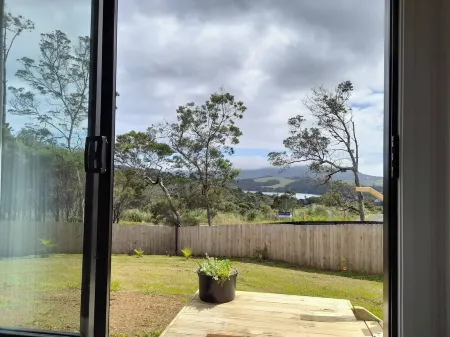 Itzy Bitzy house is colourful, cosy, fully fenced with sea views