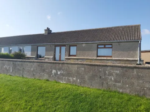Bungalow with sea-view, near small town of Thurso.