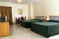Al Buhaira Hotel Apartment Отели рядом с достопримечательностью «Al Qasimia University»