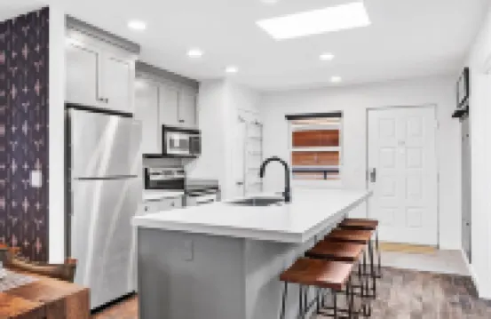 Top Floor Condo with Balcony Steps to Lifts & Main Street 2 Bedroom Condo by RedAwning